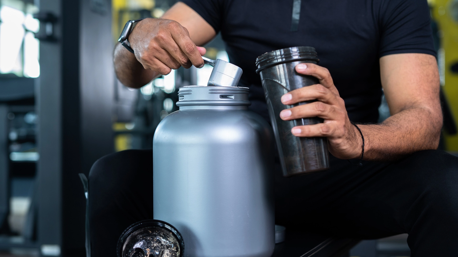 Athlete drinking whey protein shake after workout to support muscle growth